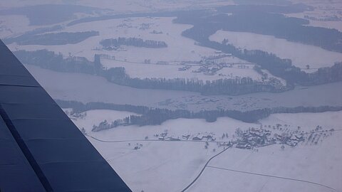 Mit Eis überzogener Schifenensee.